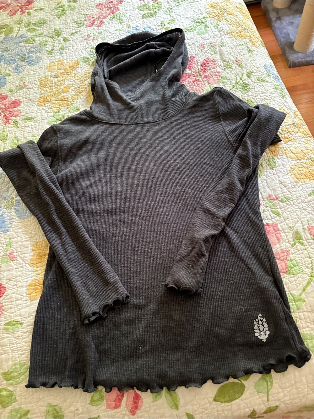 Free People hooded light weight with ruffles on the sleeves and bottom
